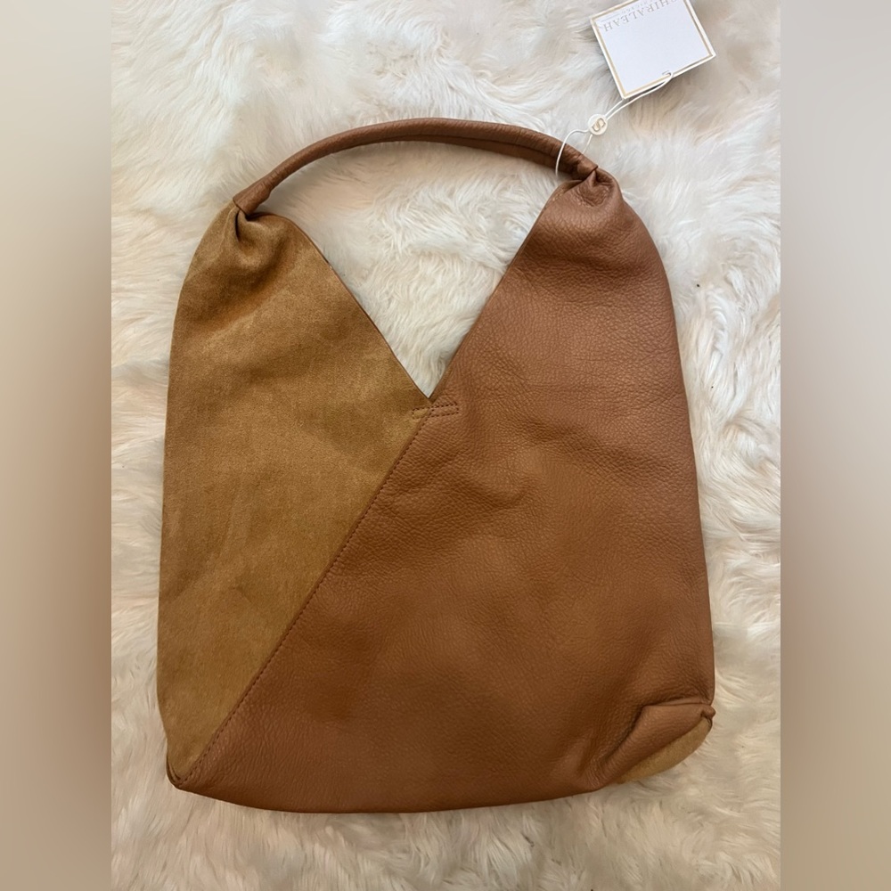 Brand new vegan leather and suede hobo bag.